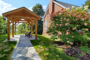 The Gathering Place, a permanent outdoor structure to replace the temporary tents.